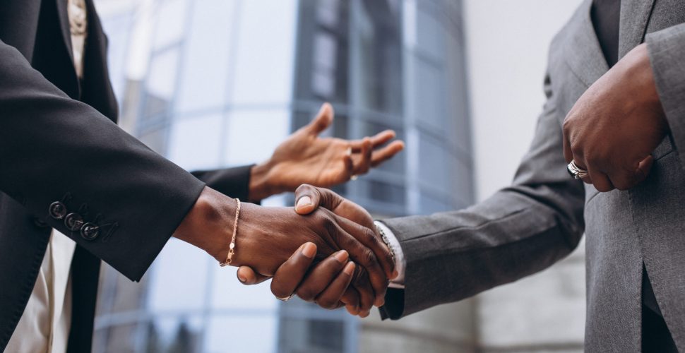 African business male people shaking hands